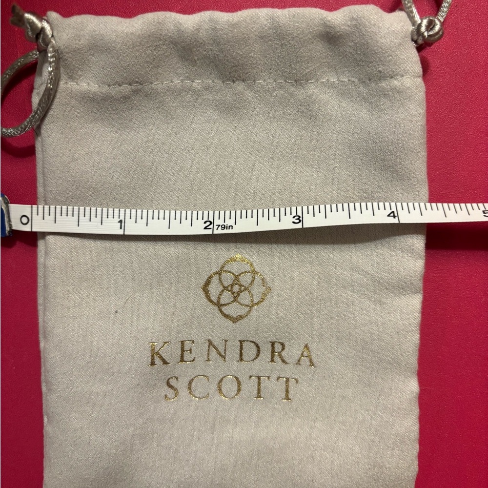 Kendra Scott Cream Pouch with Gold Logo